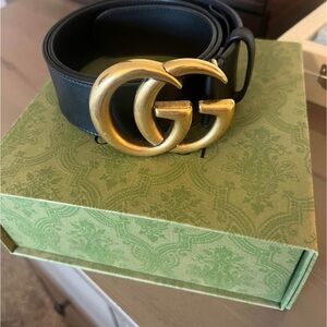Gucci Black and Gold Belt with Iconic GG Design